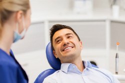 Man smiling in dental chair