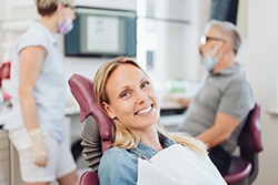 Woman smiling in the dental chair