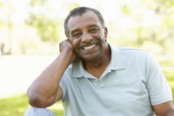 Man with beautiful smile after getting dental implants in Plano  