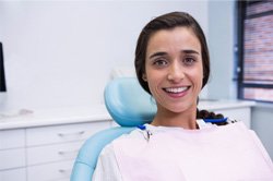 Young woman with dental implants in Plano 