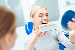 happy dental patient with mirror