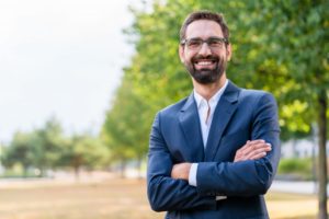 Confident business man with porcelain veneers in Plano