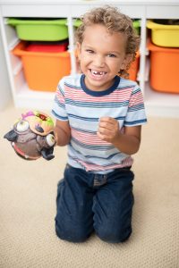 Young boy with a missing tooth